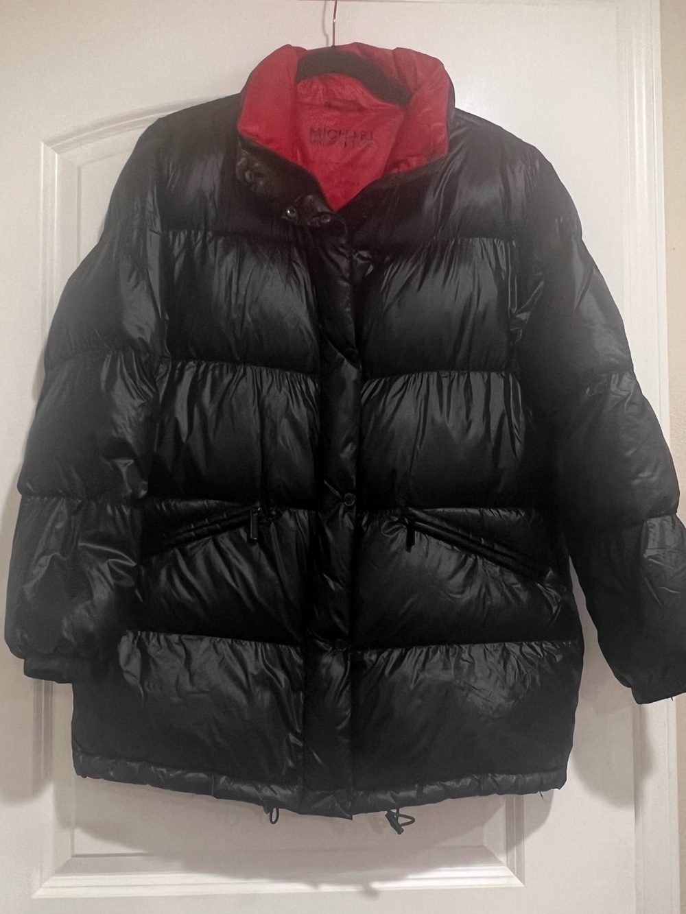Author Michael Kors Black and Red with  Logo Zipper Pull. Men’s Small woman’s L